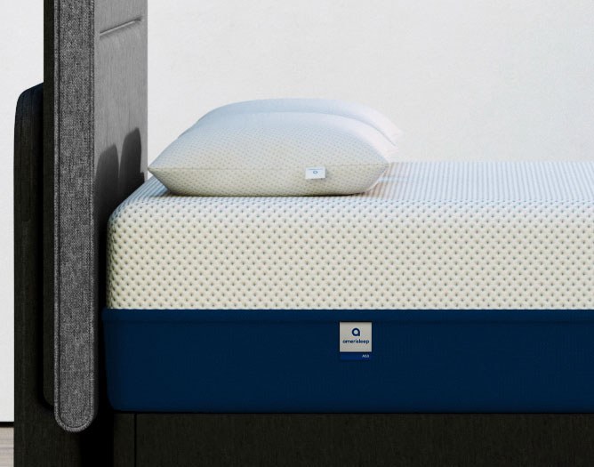 Side profile of the Amerisleep AS3 mattress on a dark bed frame