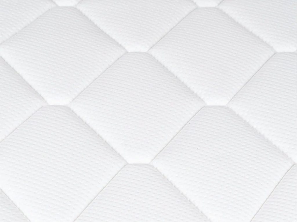 Close-up of the diamond-quilted top of the Plank Firm