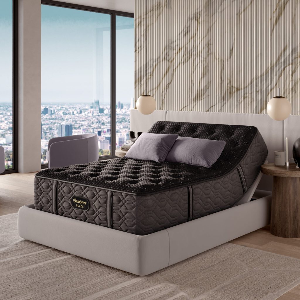 Beautyrest Black Series Three on an adjustable base in a city-view bedroom