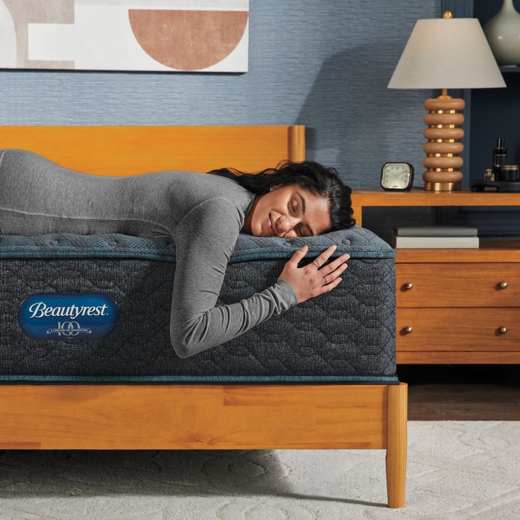 Woman resting on a Beautyrest Level One mattress