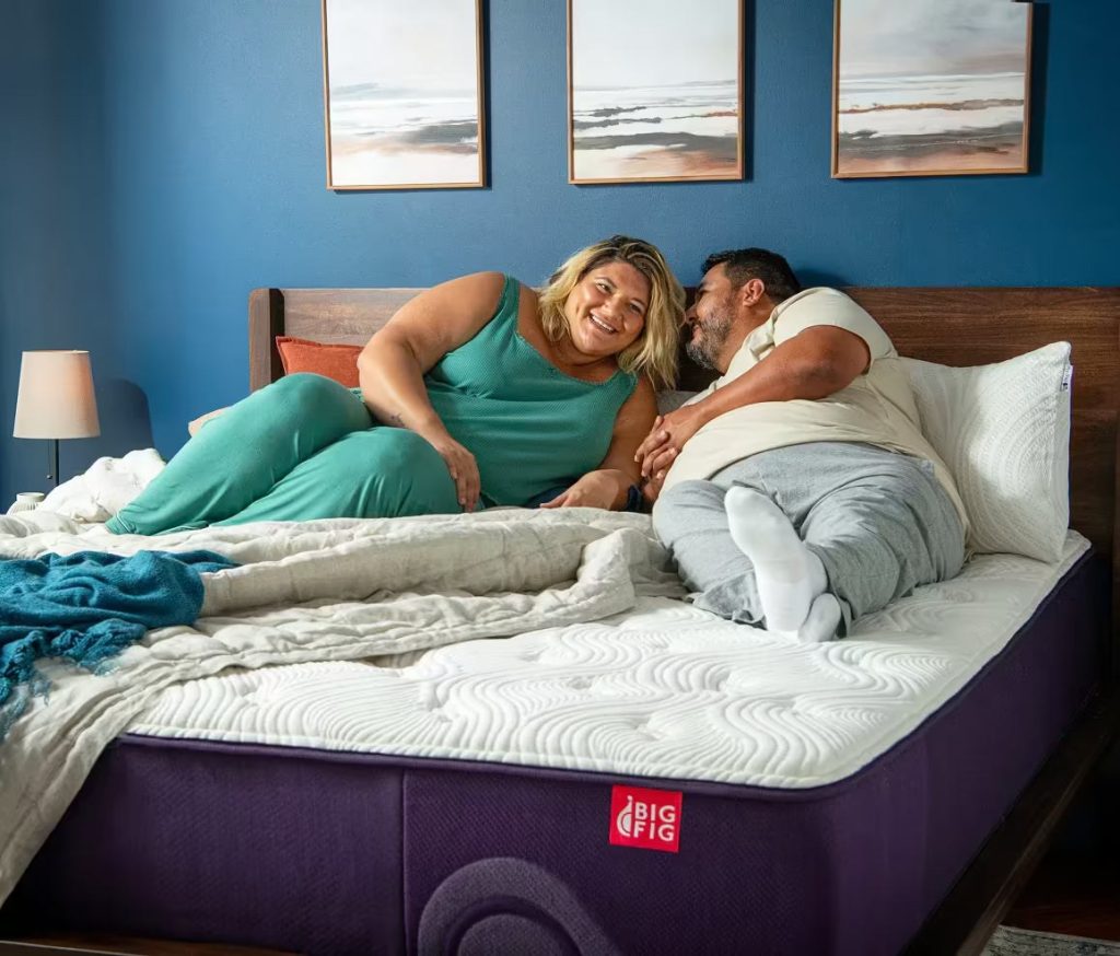 Couple relaxing on the Big Fig Classic Mattress