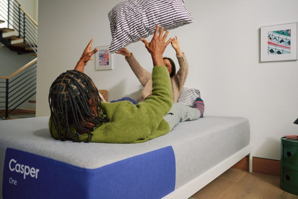 Two people having a pillow fight on Casper The One