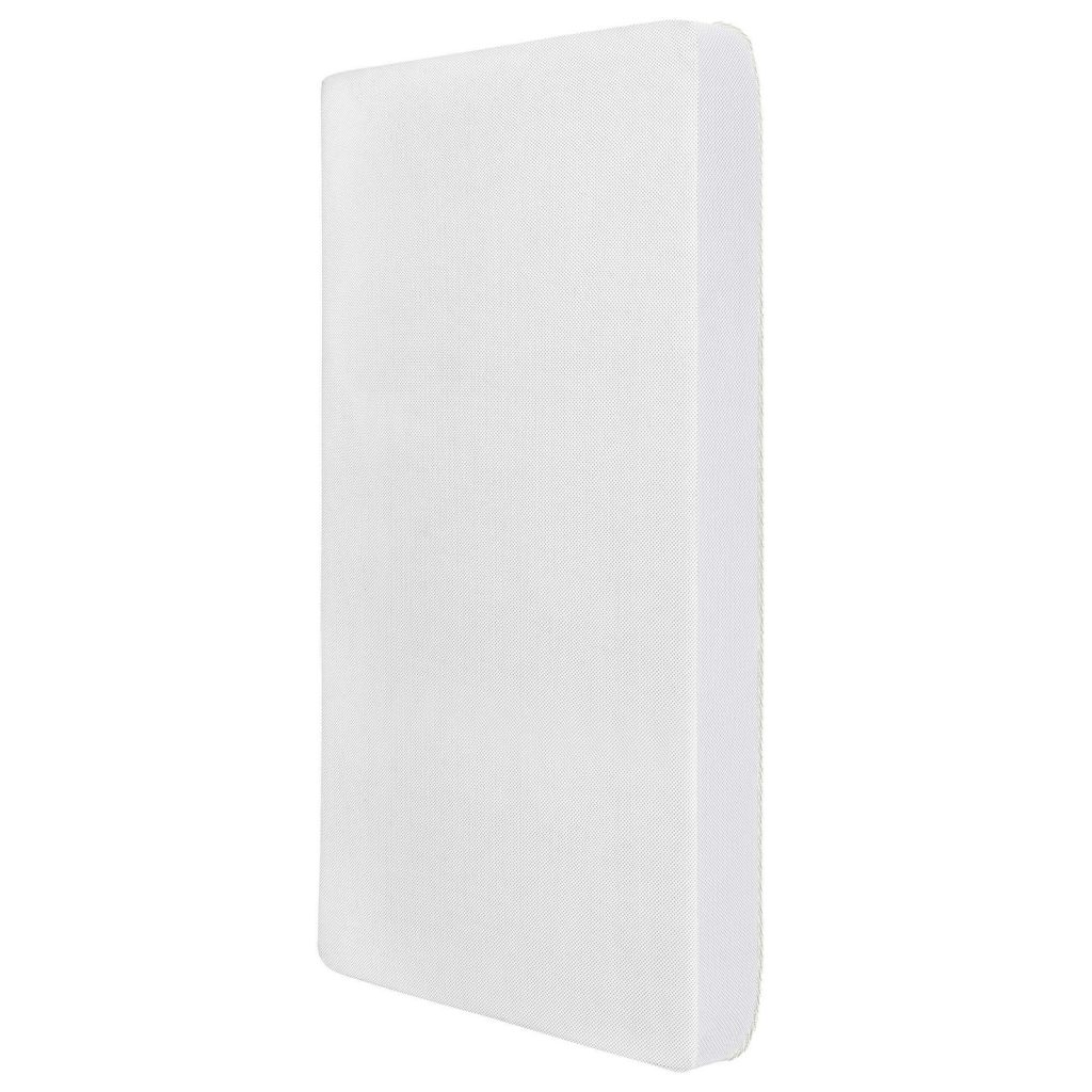 Waterproof side of the Dream On Me orthopedic foam crib mattress, angled view