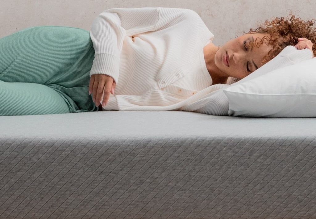 Woman sleeping on her side on the Leesa Original Mattress