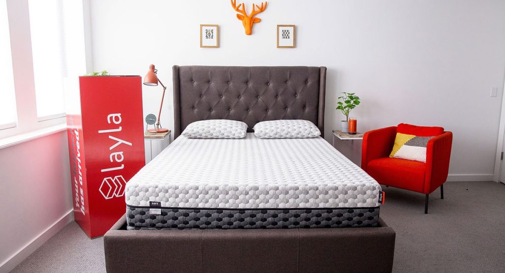 Layla Memory Foam Mattress next to its delivery box