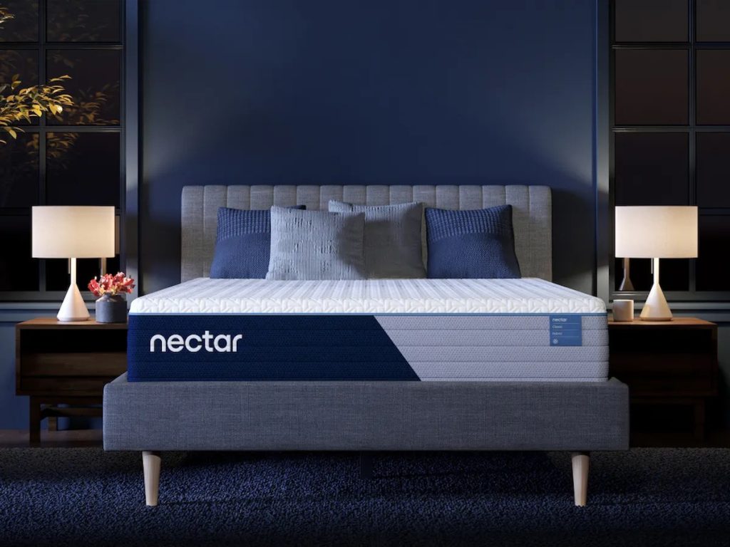 Nectar Classic Hybrid mattress, front view on an upholstered bed