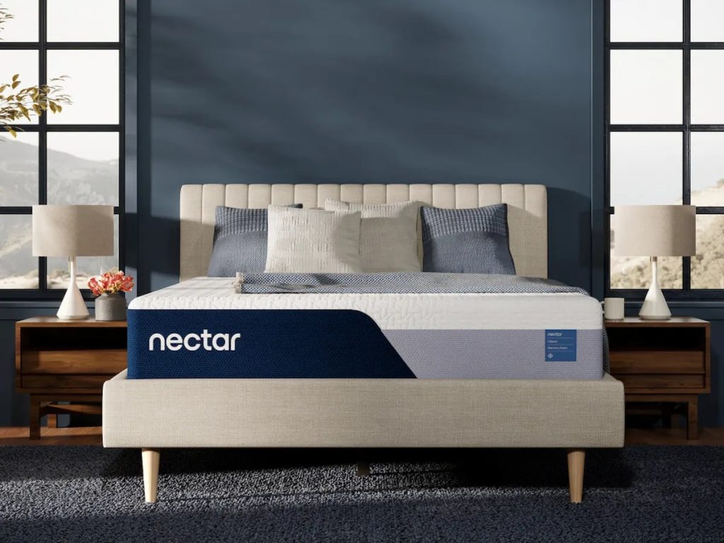 Nectar Classic Memory Foam mattress, front view on an upholstered bed