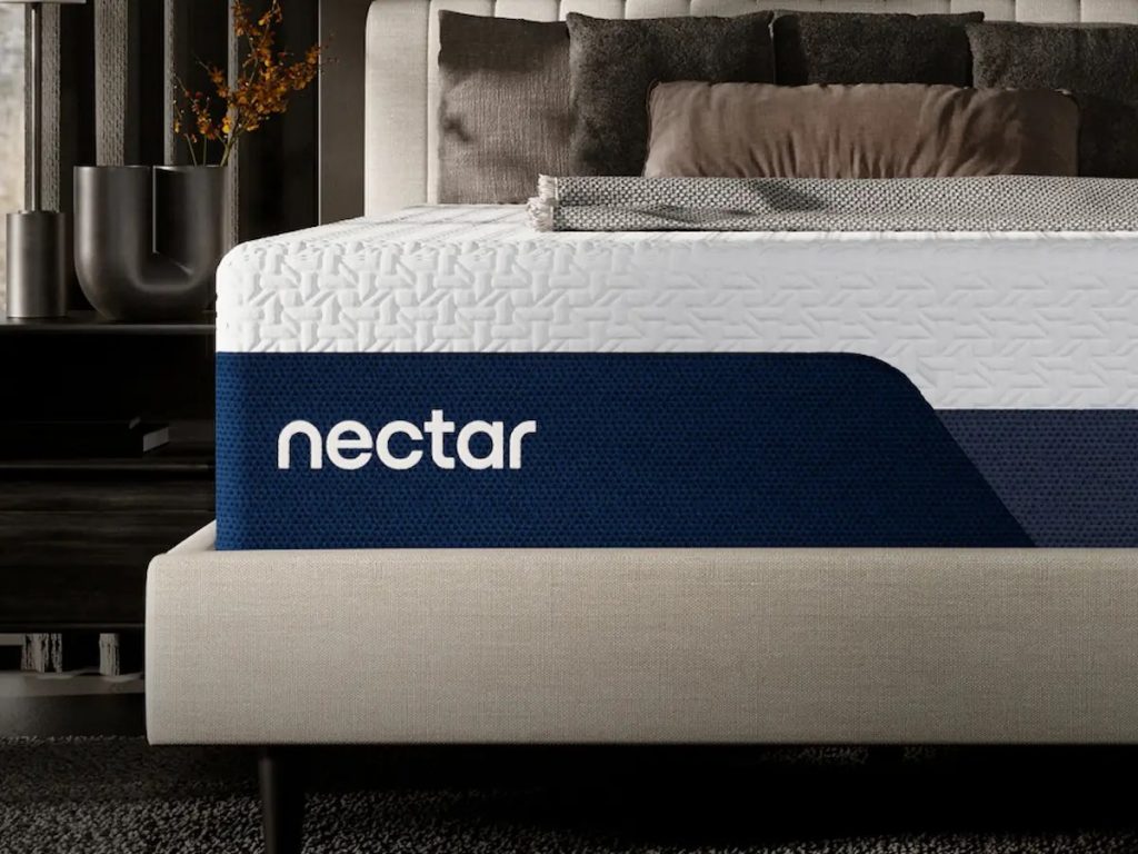 Nectar Ultra Memory Foam mattress on a beige bed base, side view of the cover