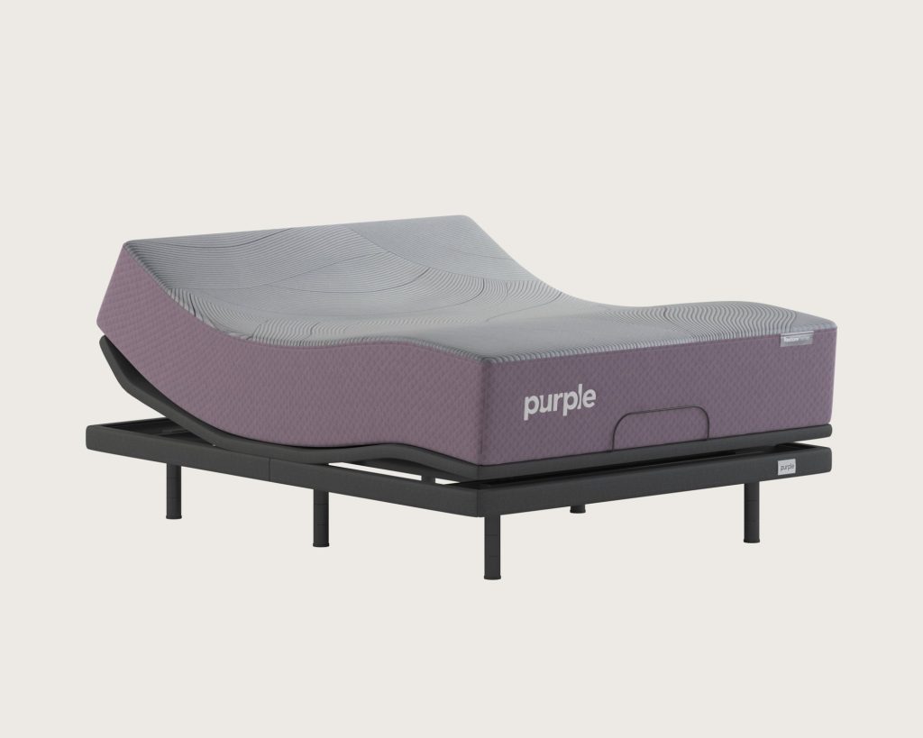 Purple RestorePremier Hybrid on a smart base with the head raised, plain background