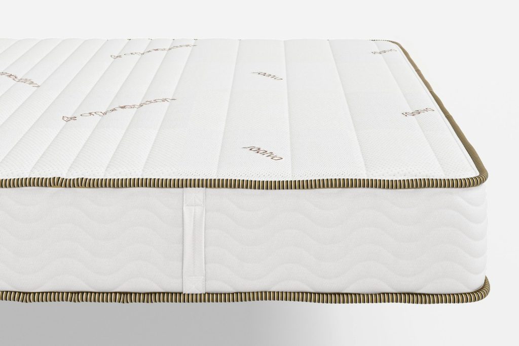 Corner of the Saatva Zenhaven showing the quilted organic cotton cover