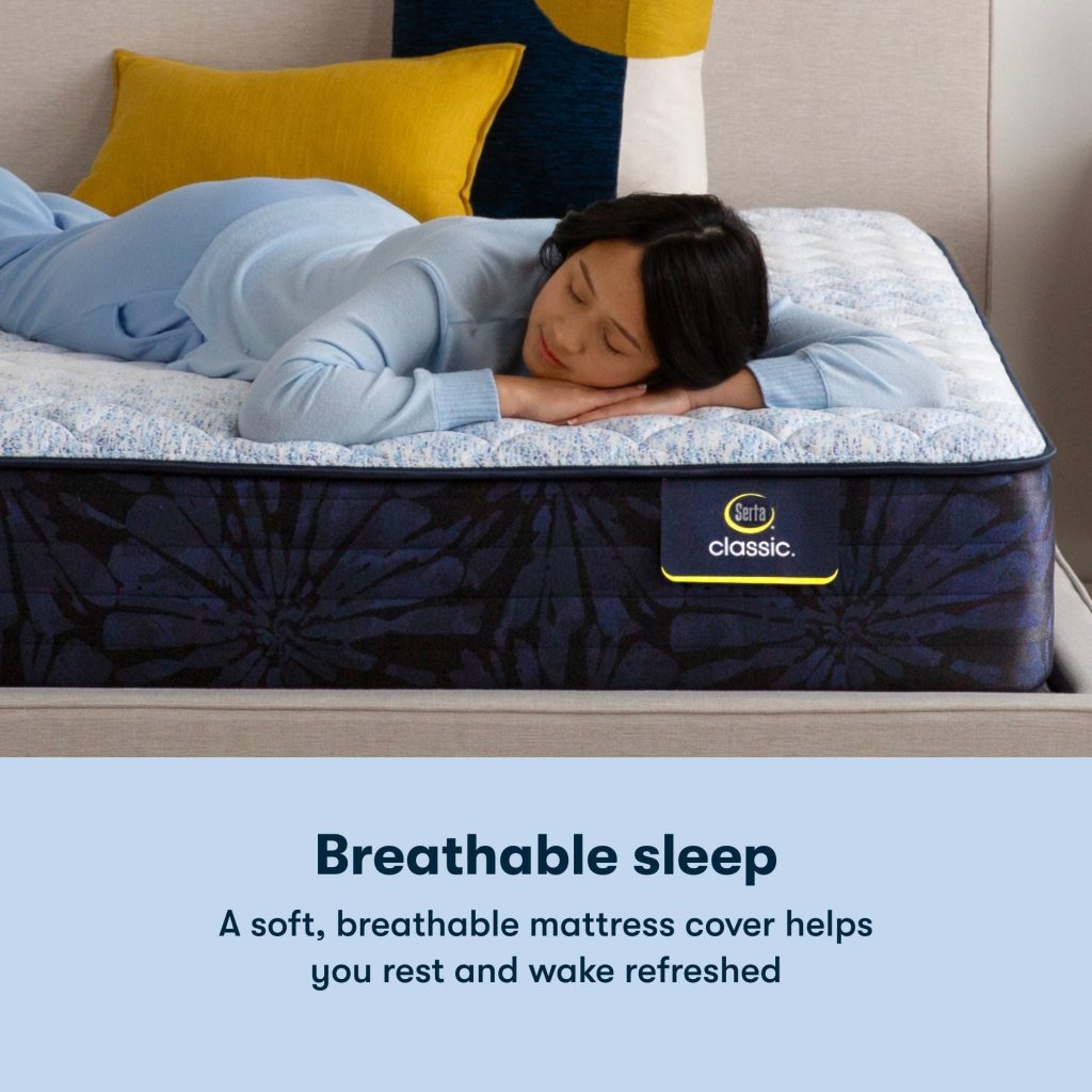 Woman lying on her stomach on a Serta Classic mattress