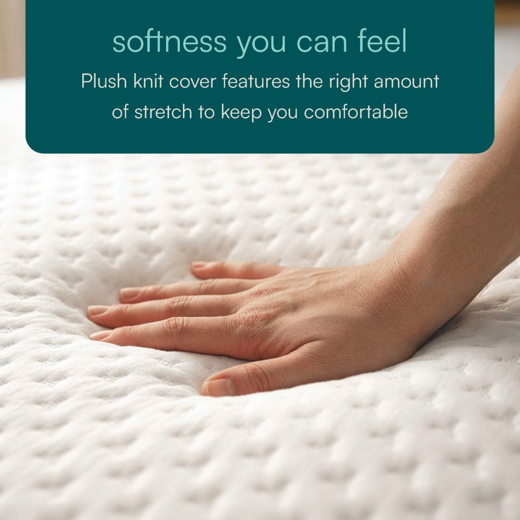Hand pressing the plush knit cover of the Sleep Number ComfortMode mattress