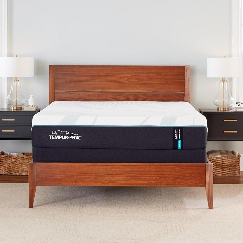 TEMPUR-Adapt mattress seen head-on on a wooden bed