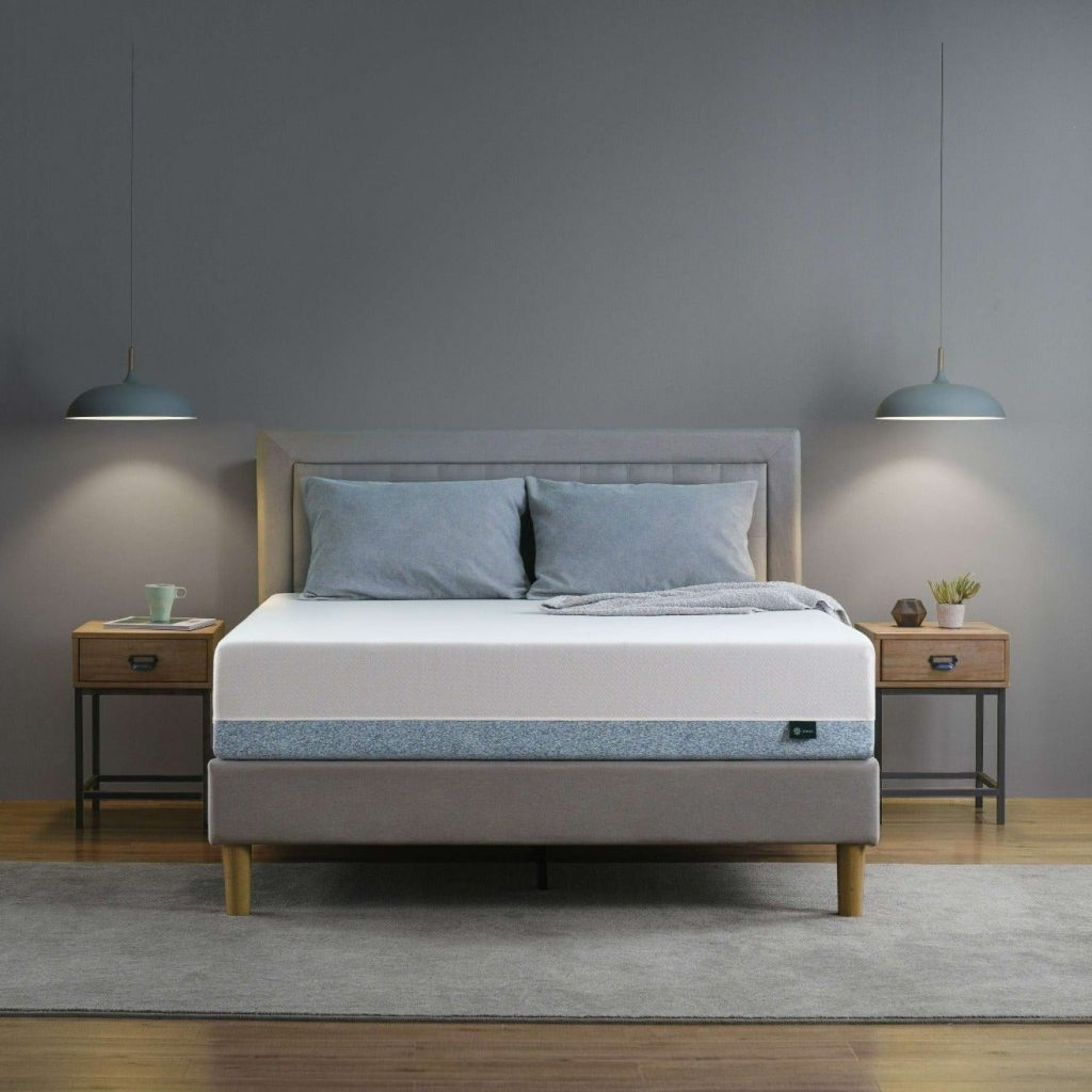 Zinus Original Green Tea mattress on a platform bed in a gray bedroom